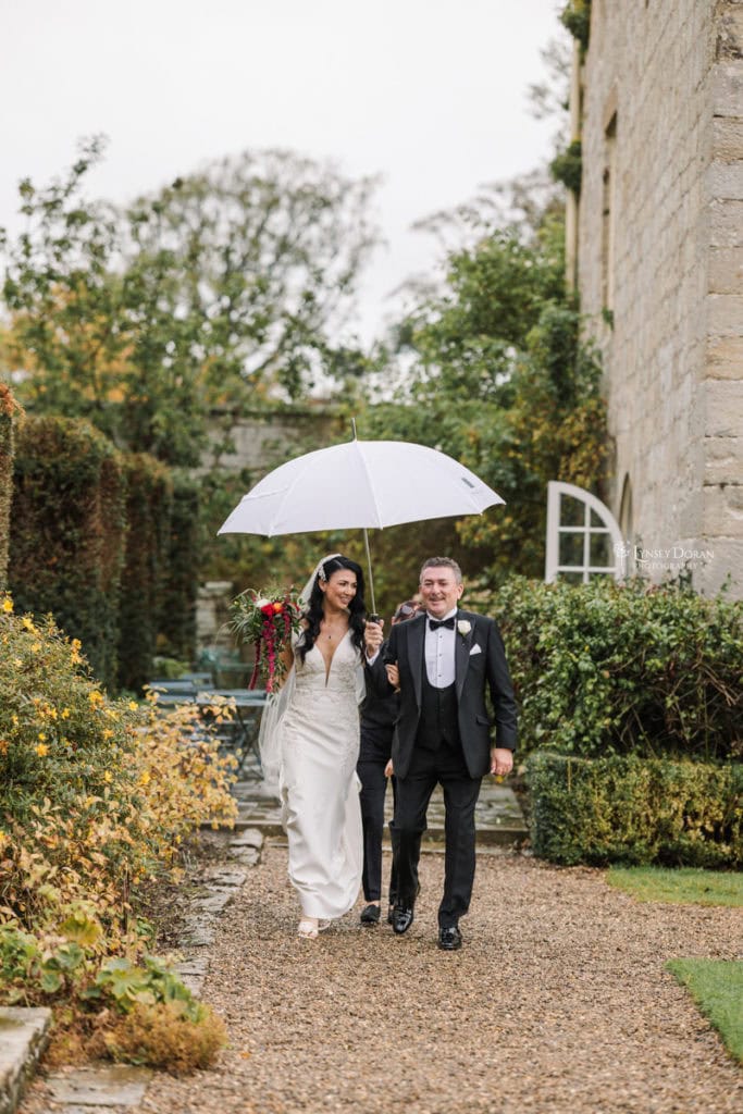 Rainy wedding day photography at Shortflatt tower in Northumberland